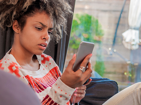 woman-looking-at-phone-1