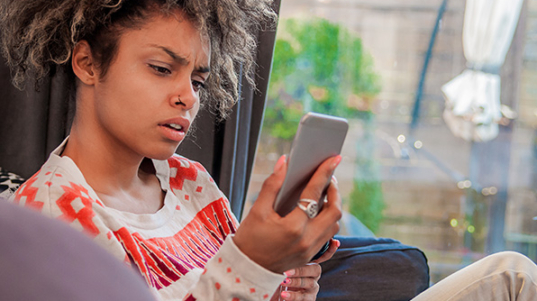 woman-looking-at-phone-1