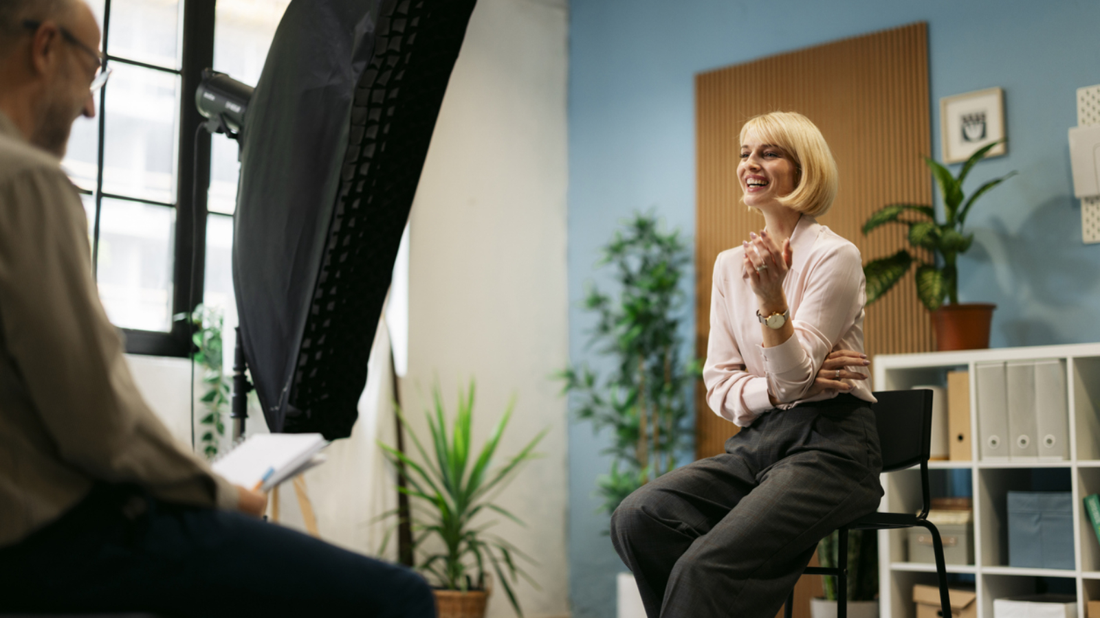 Professionals creating content in a modern photography studio