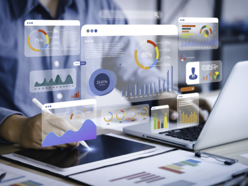 An analyst uses a computer and dashboard for data business analysis and Data Management System with KPI and metrics connected to the database for technology finance, operations, sales, marketing